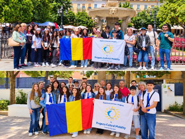 Two Erasmus school groups from Romania with Projects Cultural Mobility flags in Malaga